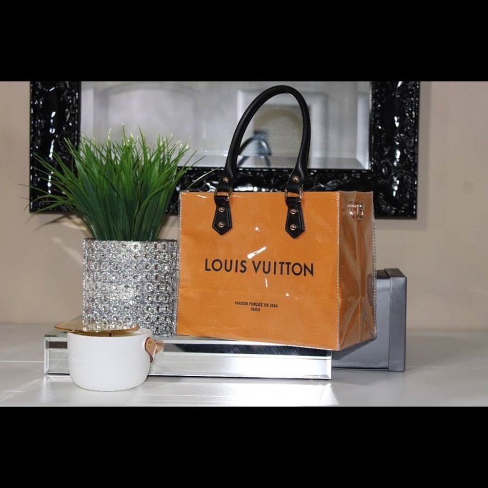 Designer shopping bag upcycled into a handbag
